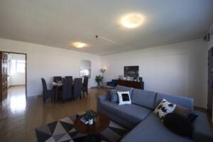 Living and dining area of a 1984 Tampines HDB flat after home staging