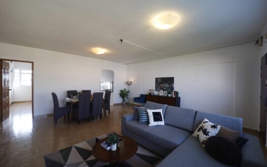 Living and dining area of a 1984 Tampines HDB flat after home staging